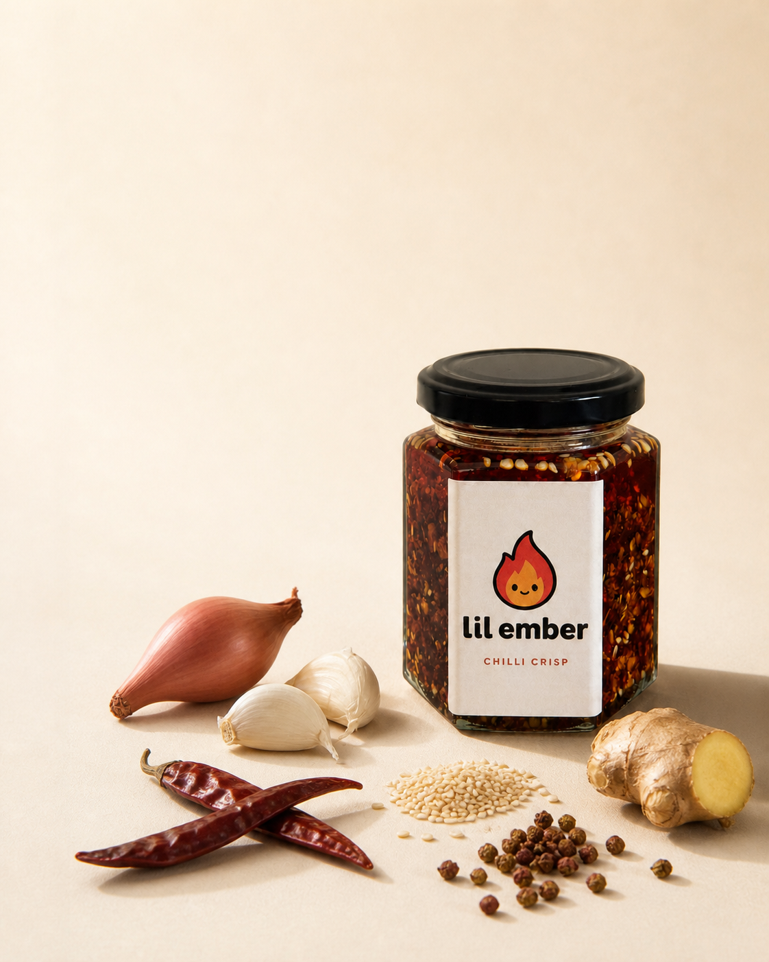 Lil Ember chilli crisp with shallot, garlic, dried chillies, sesame, Sichuan peppercorns and ginger in the warm cream studio.