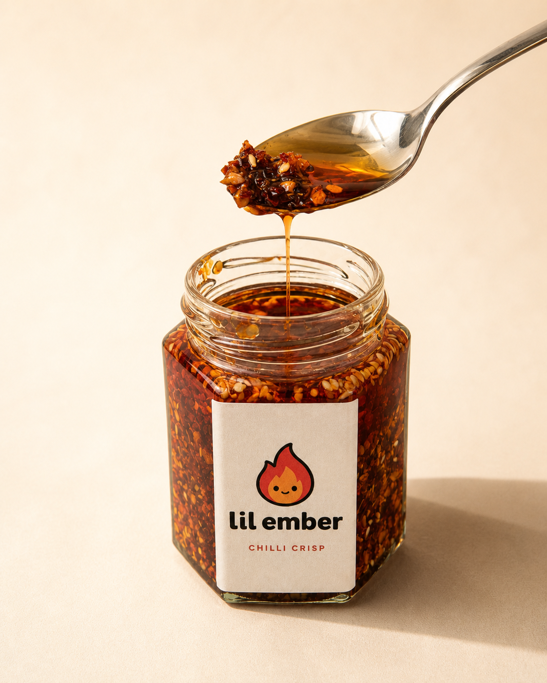Lil Ember open-jar campaign image with a loaded spoon